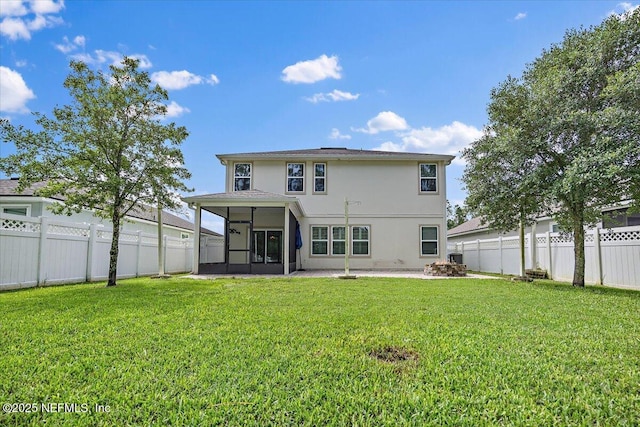 795 Shetland Dr, Saint Johns, FL 32259 - rear view of house featuring a sunroom, stucco siding, a fenced backyard, and a patio area