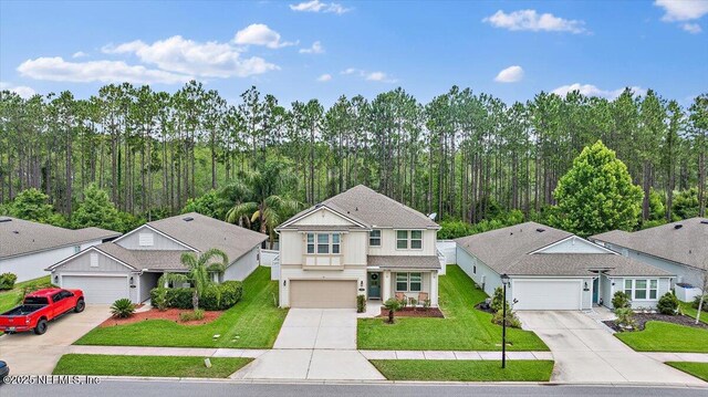 795 Shetland Dr, Saint Johns, FL 32259 - traditional-style house with concrete driveway, a garage, and a front lawn