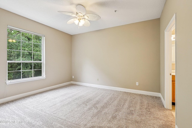 8601 Beach Blvd Unit 507, Jacksonville, FL 32216 - unfurnished room featuring light colored carpet and baseboards