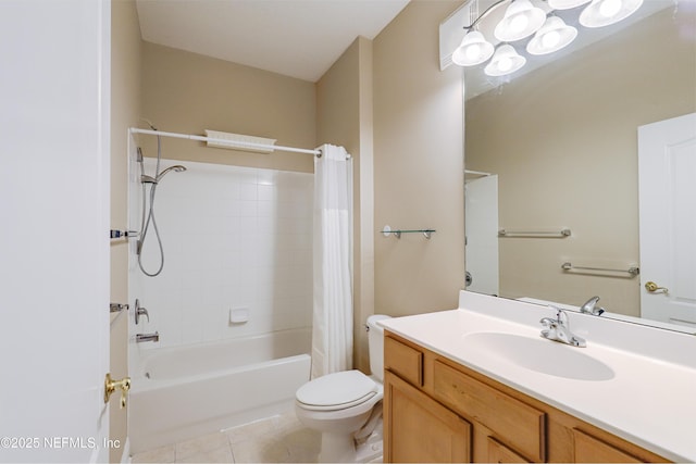 8601 Beach Blvd Unit 507, Jacksonville, FL 32216 - full bath with shower / bath combo with shower curtain, toilet, vanity, and tile patterned flooring