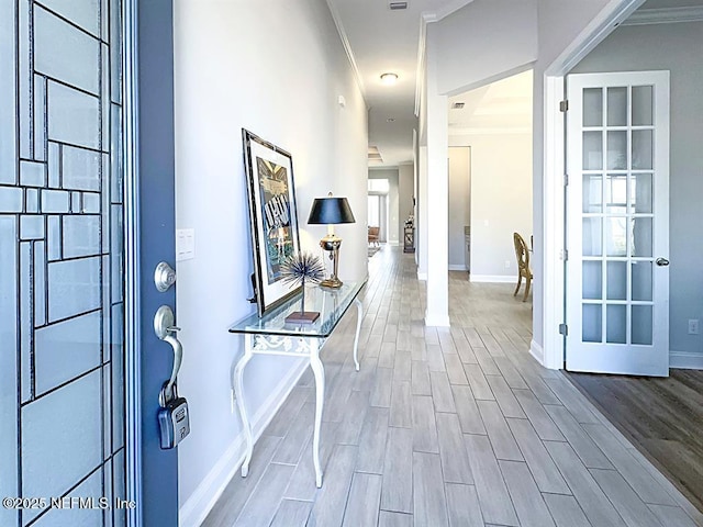 95191 Poplar Way, Fernandina Beach, FL 32034 - foyer with wood finished floors, baseboards, and crown molding