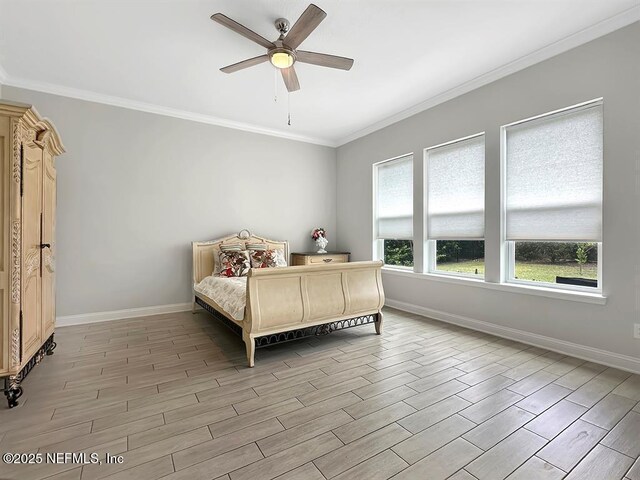 95191 Poplar Way, Fernandina Beach, FL 32034 - bedroom with crown molding, baseboards, and wood tiled floors