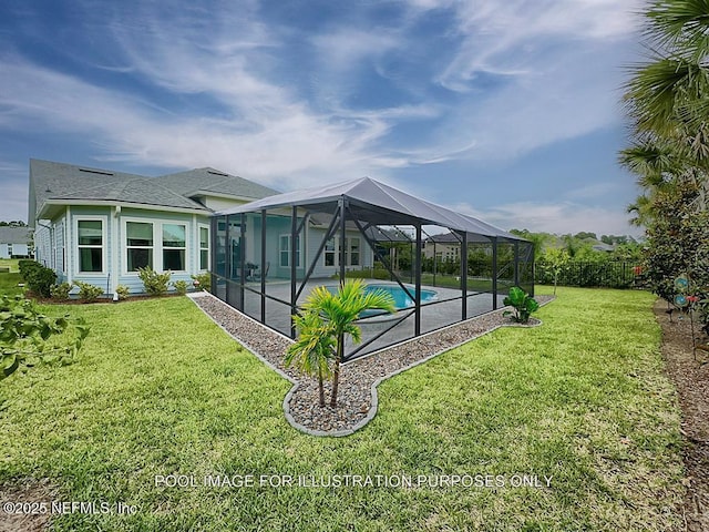95191 Poplar Way, Fernandina Beach, FL 32034 - back of property featuring a yard, a patio, and a lanai