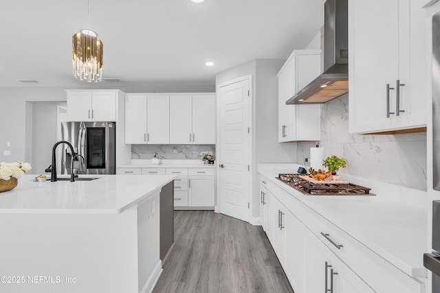 194 Napo Way, Saint Johns, FL 32259 - kitchen with wall chimney exhaust hood, stainless steel appliances, light countertops, decorative backsplash, and recessed lighting