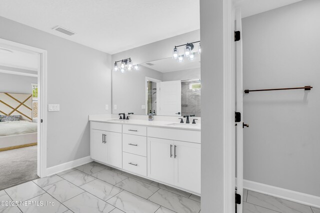 194 Napo Way, Saint Johns, FL 32259 - bathroom featuring ensuite bathroom, double vanity, marble look tiles, and an enclosed shower