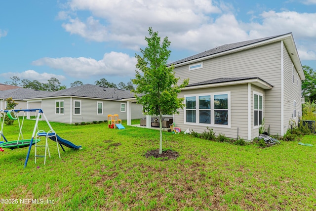 194 Napo Way, Saint Johns, FL 32259 - rear view of house featuring a playground and a yard