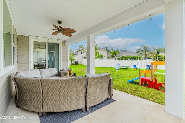 194 Napo Way, Saint Johns, FL 32259 - fenced backyard with a patio, a ceiling fan, an outdoor living space, and a playground