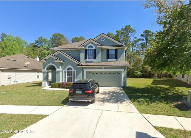 3917 Anderson Woods Dr, Jacksonville, FL 32218 - traditional home with driveway, stucco siding, an attached garage, and a front lawn