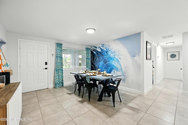 2734 Colonies Dr, Jacksonville Beach, FL 32250 - dining room with light tile patterned floors and baseboards