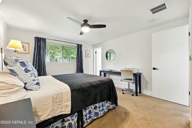 2734 Colonies Dr, Jacksonville Beach, FL 32250 - carpeted bedroom with a ceiling fan and baseboards