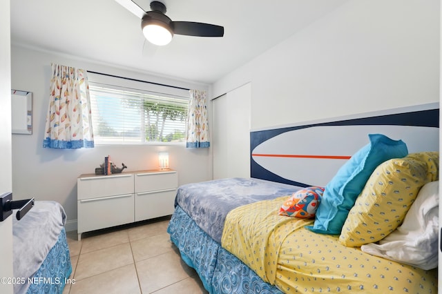2734 Colonies Dr, Jacksonville Beach, FL 32250 - bedroom featuring light tile patterned flooring and ceiling fan