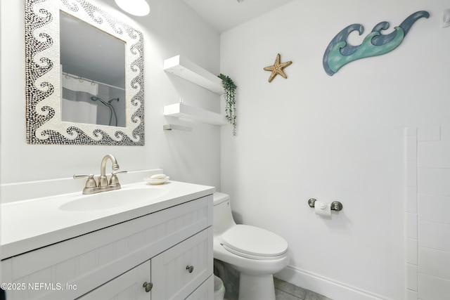 2734 Colonies Dr, Jacksonville Beach, FL 32250 - full bath with toilet, vanity, baseboards, and tile patterned flooring