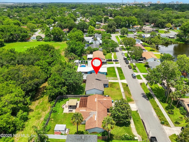 2734 Colonies Dr, Jacksonville Beach, FL 32250 - aerial view of residential area with a nearby body of water and a tree filled landscape