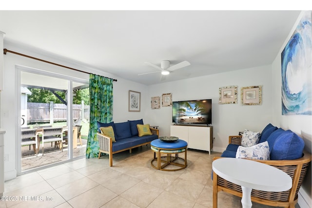2734 Colonies Dr, Jacksonville Beach, FL 32250 - living room featuring ceiling fan and light tile patterned floors