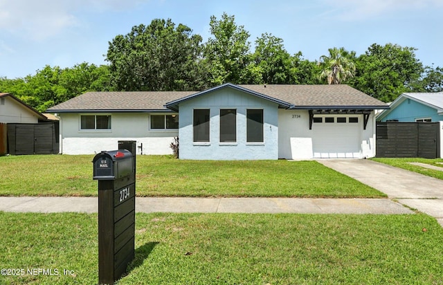2734 Colonies Dr, Jacksonville Beach, FL 32250 - ranch-style home featuring a garage, concrete driveway, and stucco siding