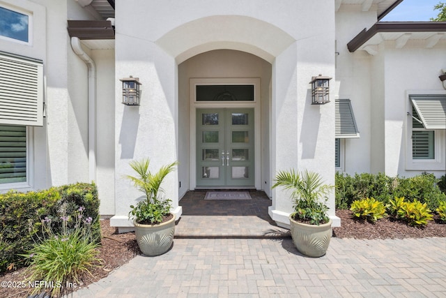 1332 N Loop Pkwy, Saint Augustine, FL 32095 - doorway to property featuring stucco siding and french doors