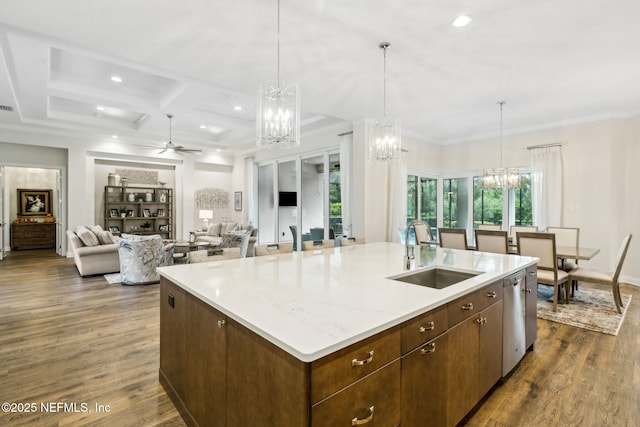 1332 N Loop Pkwy, Saint Augustine, FL 32095 - kitchen with a chandelier, dark wood finished floors, a center island with sink, recessed lighting, and a ceiling fan