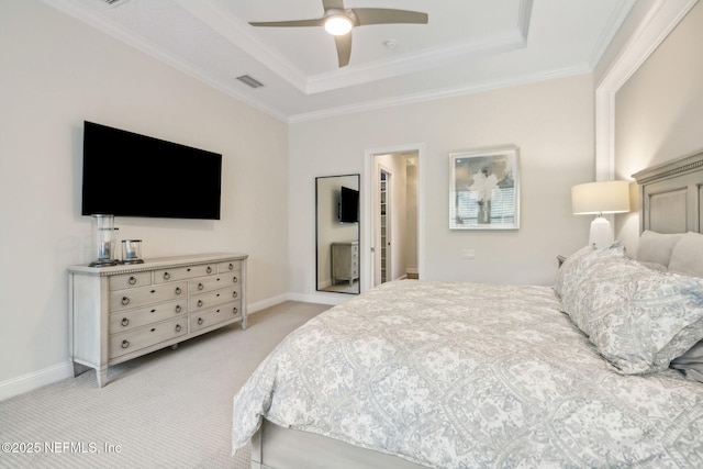 1332 N Loop Pkwy, Saint Augustine, FL 32095 - bedroom featuring a raised ceiling, light colored carpet, ornamental molding, and a ceiling fan