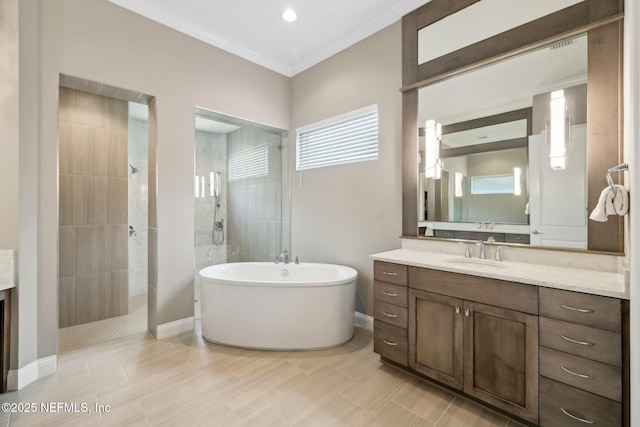 1332 N Loop Pkwy, Saint Augustine, FL 32095 - bathroom with a freestanding bath, walk in shower, and vanity