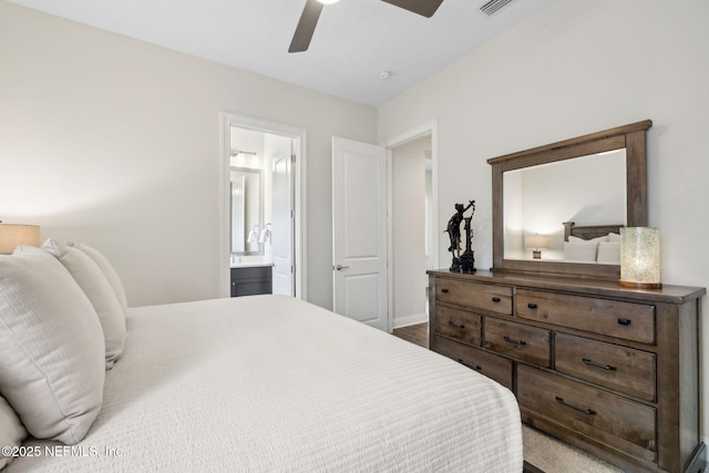 1332 N Loop Pkwy, Saint Augustine, FL 32095 - bedroom featuring ensuite bathroom and a ceiling fan