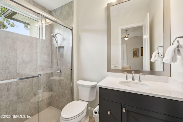 1332 N Loop Pkwy, Saint Augustine, FL 32095 - full bath with vanity, a shower stall, and a ceiling fan