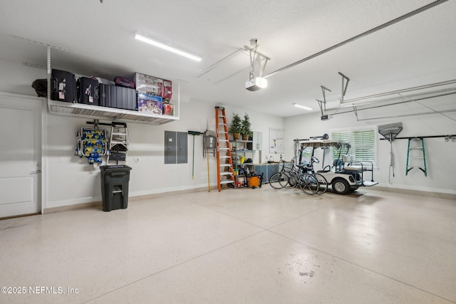 1332 N Loop Pkwy, Saint Augustine, FL 32095 - garage with a garage door opener and electric panel