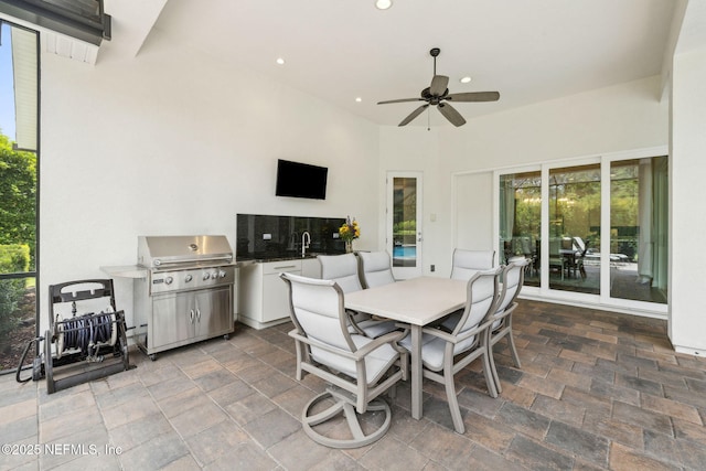 1332 N Loop Pkwy, Saint Augustine, FL 32095 - view of patio / terrace with outdoor dining area, area for grilling, and ceiling fan