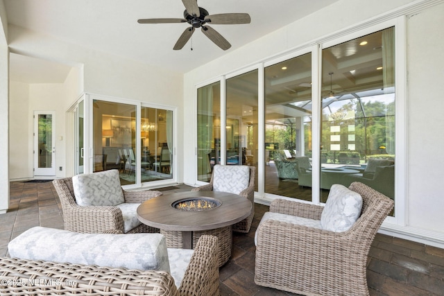 1332 N Loop Pkwy, Saint Augustine, FL 32095 - sunroom with a ceiling fan and an outdoor fire pit