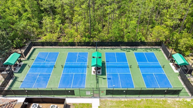 1332 N Loop Pkwy, Saint Augustine, FL 32095 - view of tennis court featuring a view of trees
