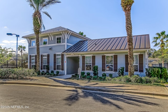 1332 N Loop Pkwy, Saint Augustine, FL 32095 - view of front facade with a metal roof and a standing seam roof