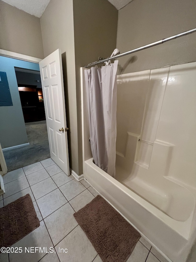 3610 Kirkpatrick Cir Unit 8, Jacksonville, FL 32210 - bathroom featuring shower / bath combo, tile patterned floors, and baseboards
