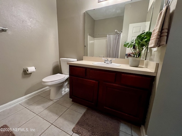 3610 Kirkpatrick Cir Unit 8, Jacksonville, FL 32210 - full bathroom featuring tile patterned flooring, vanity, toilet, baseboards, and curtained shower