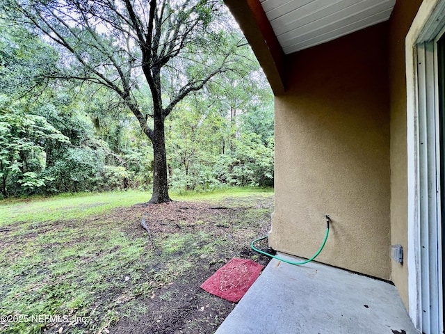 3610 Kirkpatrick Cir Unit 8, Jacksonville, FL 32210 - view of yard with a view of trees
