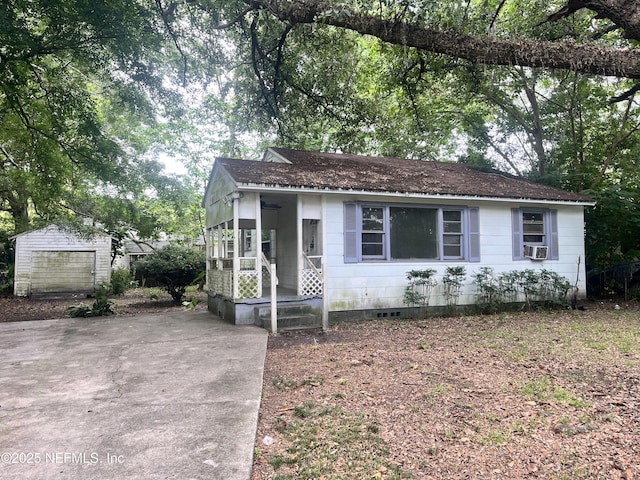 3526 Poinsetta St, Jacksonville, FL 32254 - view of front facade featuring crawl space, an outbuilding, and cooling unit