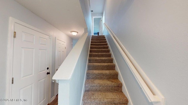 1318 Lake Shore Blvd, Jacksonville, FL 32205 - staircase featuring carpet