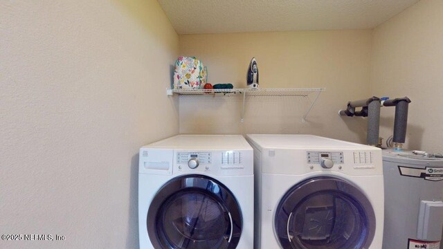 1318 Lake Shore Blvd, Jacksonville, FL 32205 - washroom featuring electric water heater and washing machine and dryer