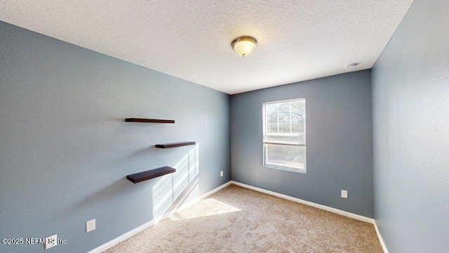 1318 Lake Shore Blvd, Jacksonville, FL 32205 - carpeted empty room with a textured ceiling and baseboards