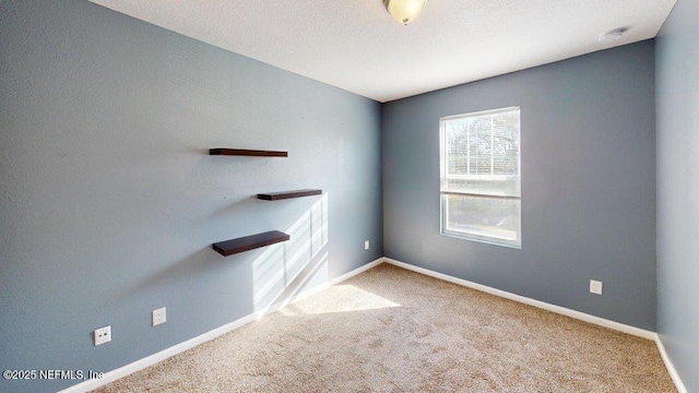 1318 Lake Shore Blvd, Jacksonville, FL 32205 - spare room with carpet, baseboards, and a smoke detector