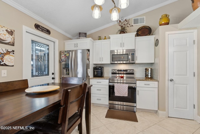 11087 Danzig Way, Jacksonville, FL 32257 - kitchen featuring appliances with stainless steel finishes, backsplash, ornamental molding, white cabinetry, and light tile patterned flooring