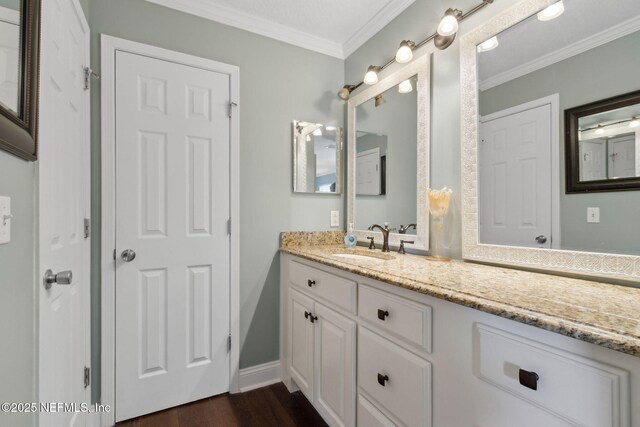 11087 Danzig Way, Jacksonville, FL 32257 - bathroom featuring vanity, crown molding, and wood finished floors