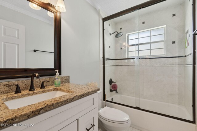 11087 Danzig Way, Jacksonville, FL 32257 - full bathroom featuring vanity, toilet, combined bath / shower with glass door, and ornamental molding