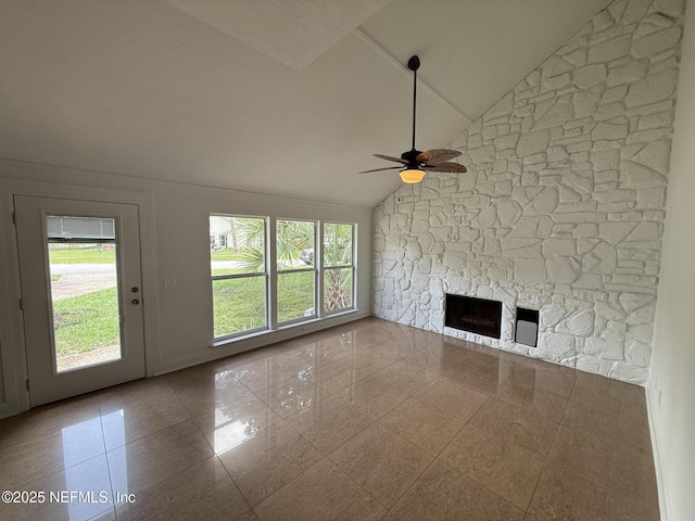 2406 Oakview Dr, Jacksonville, FL 32246 - unfurnished living room featuring a ceiling fan, plenty of natural light, a fireplace, and high vaulted ceiling