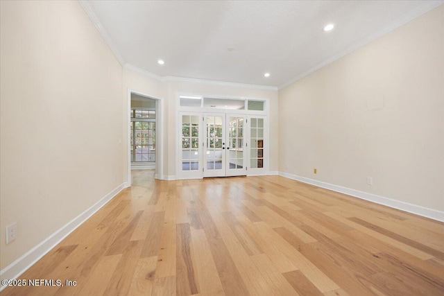 2227 Barefoot Trce, Atlantic Beach, FL 32233 - empty room with french doors, crown molding, light wood-style flooring, and recessed lighting
