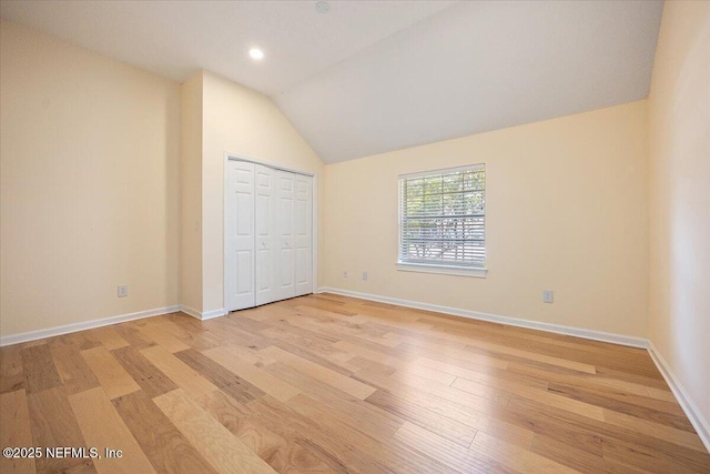 2227 Barefoot Trce, Atlantic Beach, FL 32233 - unfurnished bedroom featuring light wood-style floors, lofted ceiling, recessed lighting, and a closet