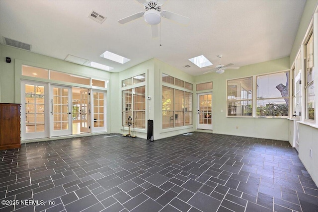 2227 Barefoot Trce, Atlantic Beach, FL 32233 - unfurnished sunroom with a skylight, french doors, and healthy amount of natural light