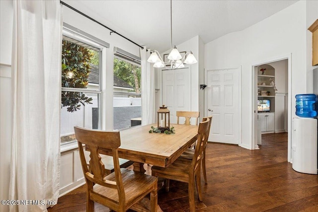 800 Marjories Way, Saint Augustine, FL 32092 - dining area with a chandelier, vaulted ceiling, and dark wood-type flooring