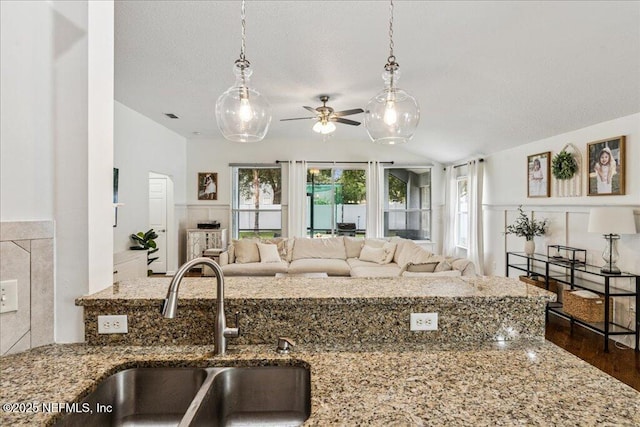 800 Marjories Way, Saint Augustine, FL 32092 - kitchen featuring open floor plan, stone counters, ceiling fan, pendant lighting, and lofted ceiling