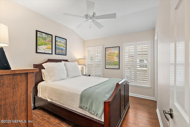 321 5th St, Atlantic Beach, FL 32233 - bedroom with dark wood finished floors, lofted ceiling, baseboards, and ceiling fan