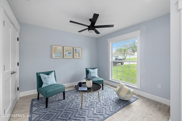3064 Hickory Glen Dr, Jacksonville, FL 32065 - sitting room with wood finished floors, baseboards, and ceiling fan