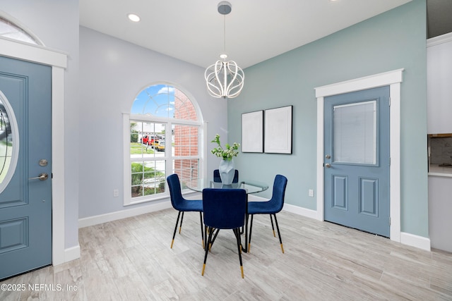 3064 Hickory Glen Dr, Jacksonville, FL 32065 - dining room featuring a chandelier, light wood-style floors, plenty of natural light, and recessed lighting